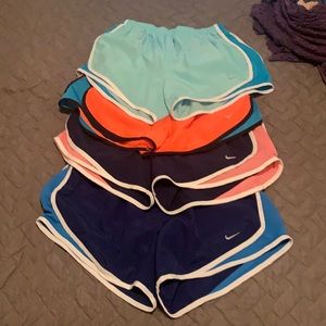4 Pairs of Nike Women’s Dry Tempo Shorts